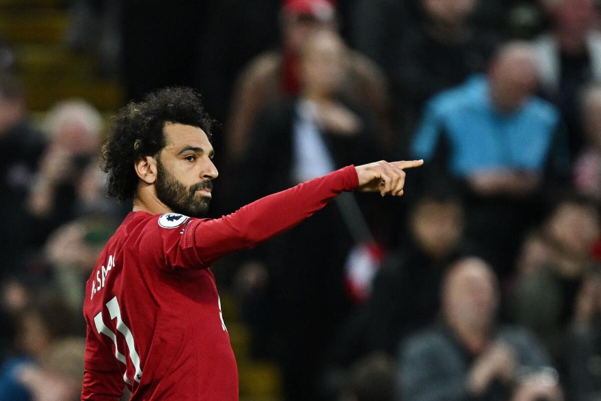 مهاجم ليفربول المصري محمد صلاح يحتفل بعد تسجيله.  - وكالة فرانس برس