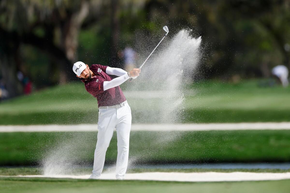 ماتيو بافون يلعب تسديدة من مخبأ في بطولة اللاعبين في ملعب الملعب في TPC Sawgrass، فلوريدا.  - وكالة فرانس برس