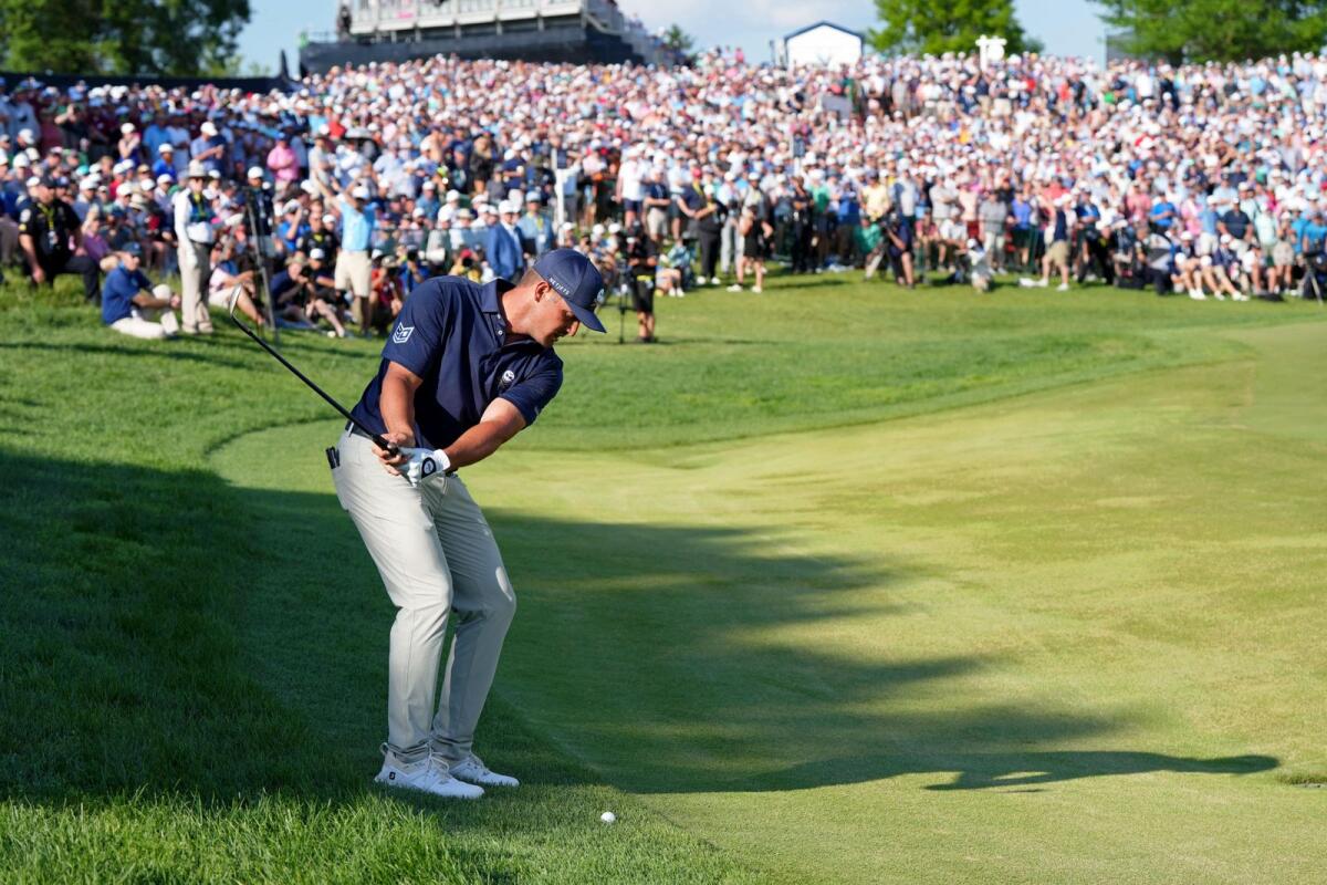 يشارك Bryson DeChambeau في الحفرة الثامنة عشرة في بطولة PGA Championship للغولف في نادي Valhalla للغولف.  -الولايات المتحدة الأمريكية اليوم الرياضة