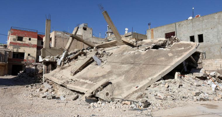 المباني المتضررة والركام في حولا، وهي قرية قريبة من الحدود مع إسرائيل، جنوب لبنان، بعد الغارات الإسرائيلية، في 11 أكتوبر 2025. 